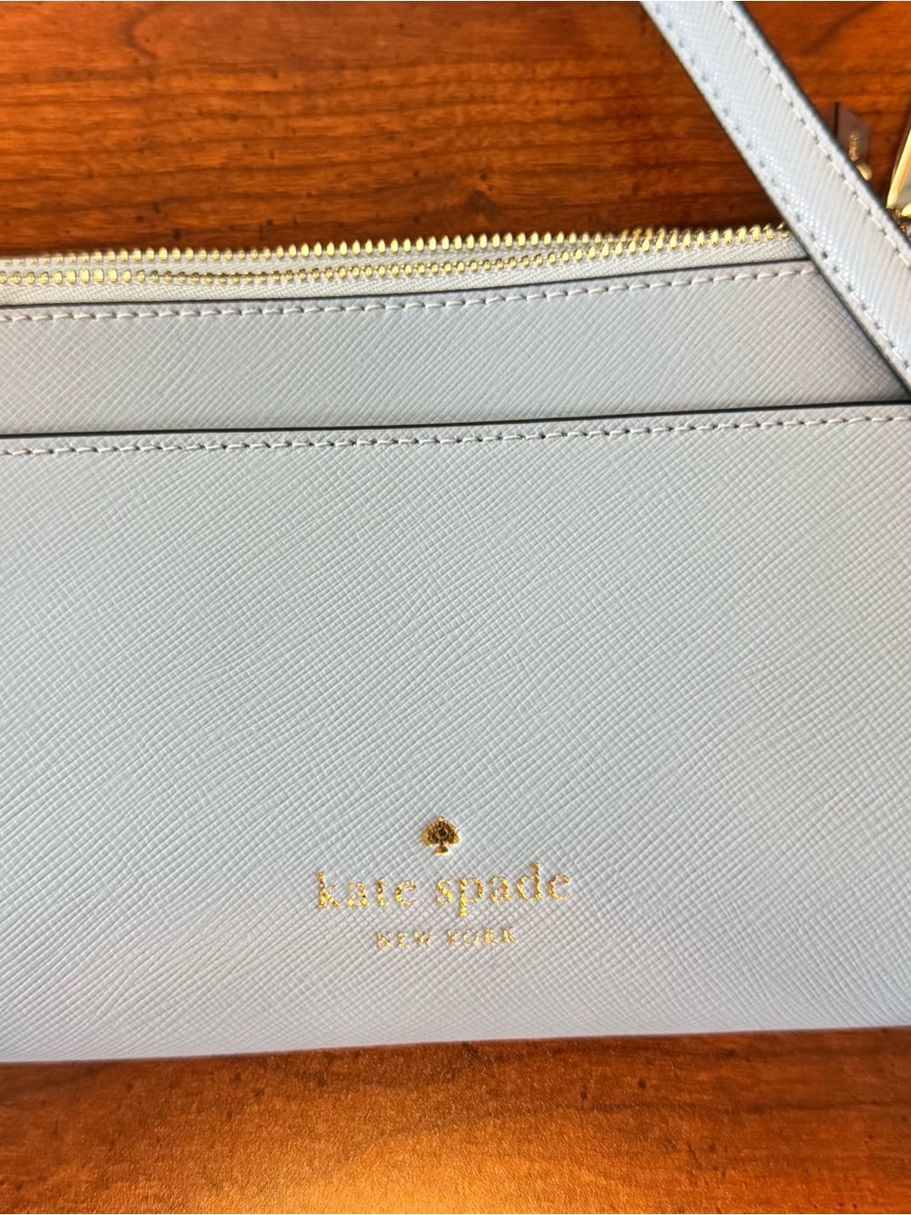 kate spade powder blue saffiano crossbody with gold logo